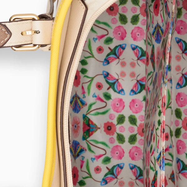 Two structured inner compartments keep workday essentials easy to find.