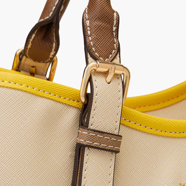 Smooth vegan leather and premium metal hardware give it a polished everyday finish.
