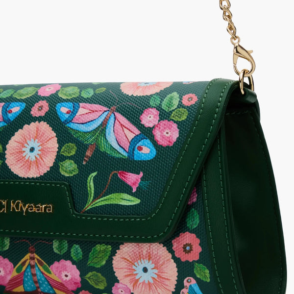 Premium vegan leather with a polished metal chain strap to go hands-free.