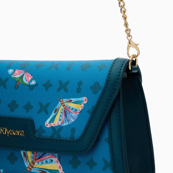Premium vegan leather with a polished metal chain strap to go hands-free.