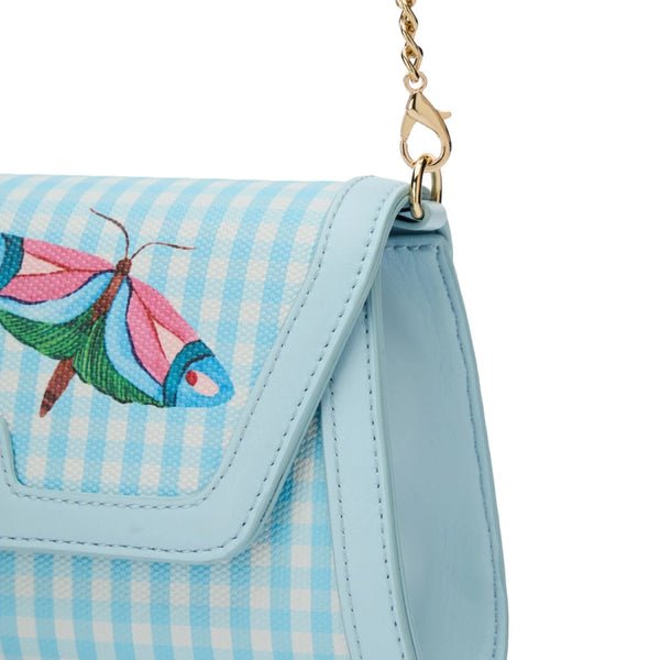 Premium vegan leather with a polished metal chain strap to go hands-free.