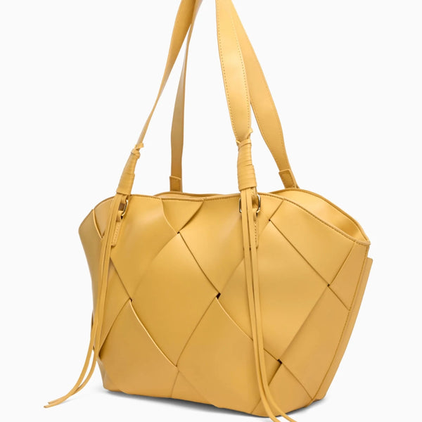 Soft vegan leather with a structured build stays upright, even when full.